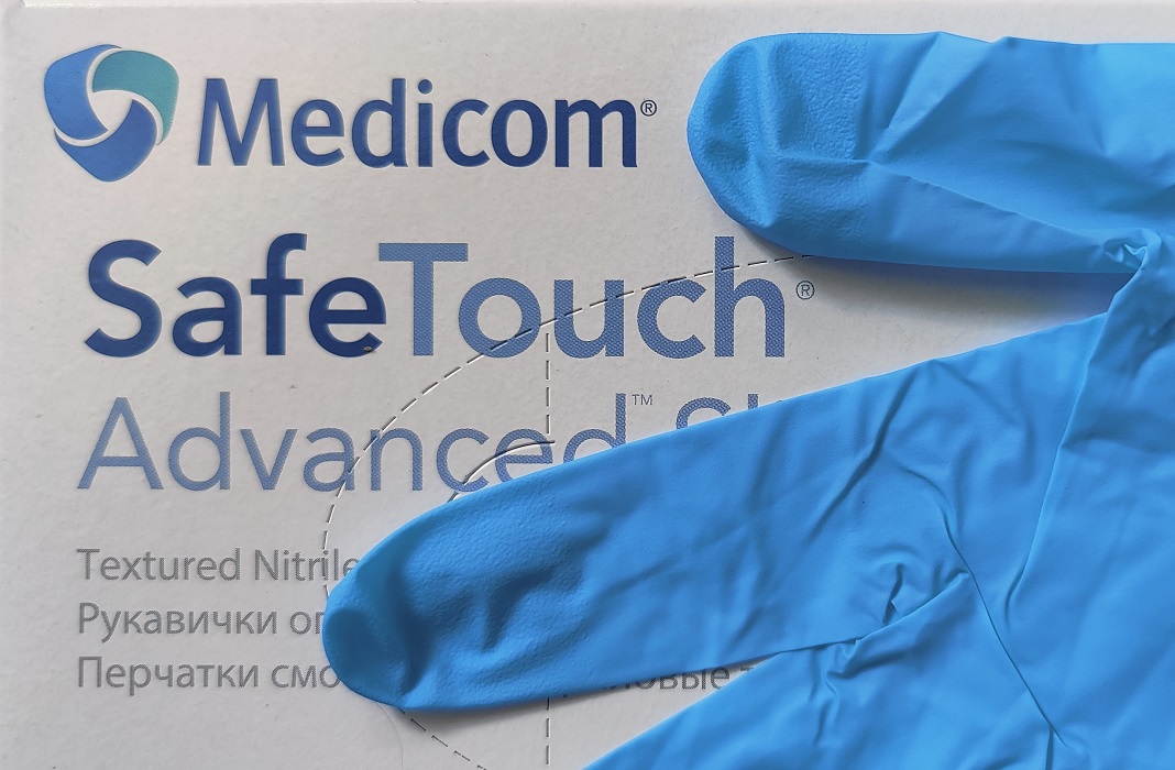 Перчатки смотровые нитриловые текстурированные нестерильные без пудры „SafeTouch Slim Blue” 4,2 г